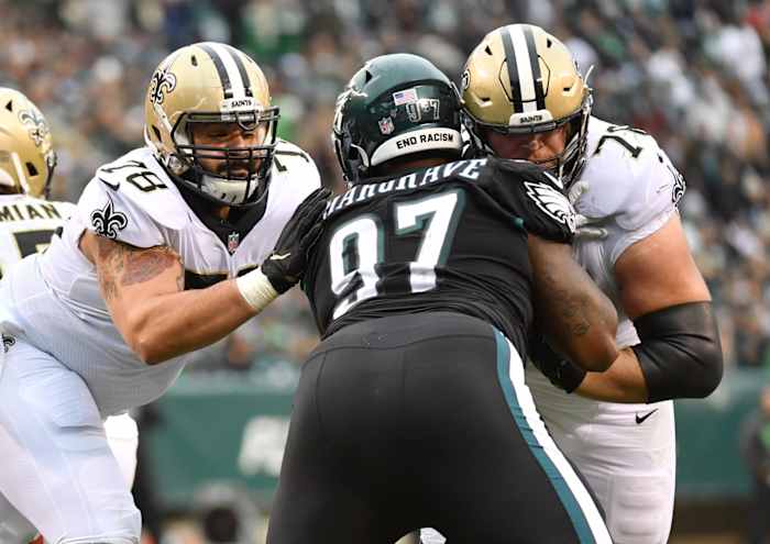 Nov 21, 2021; New Orleans Saints center Erik McCoy (78) and guard Calvin Throckmorton (76) block Philadelphia Eagles defensive tackle Javon Hargrave (97). Mandatory Credit: Eric Hartline-USA TODAY Sports